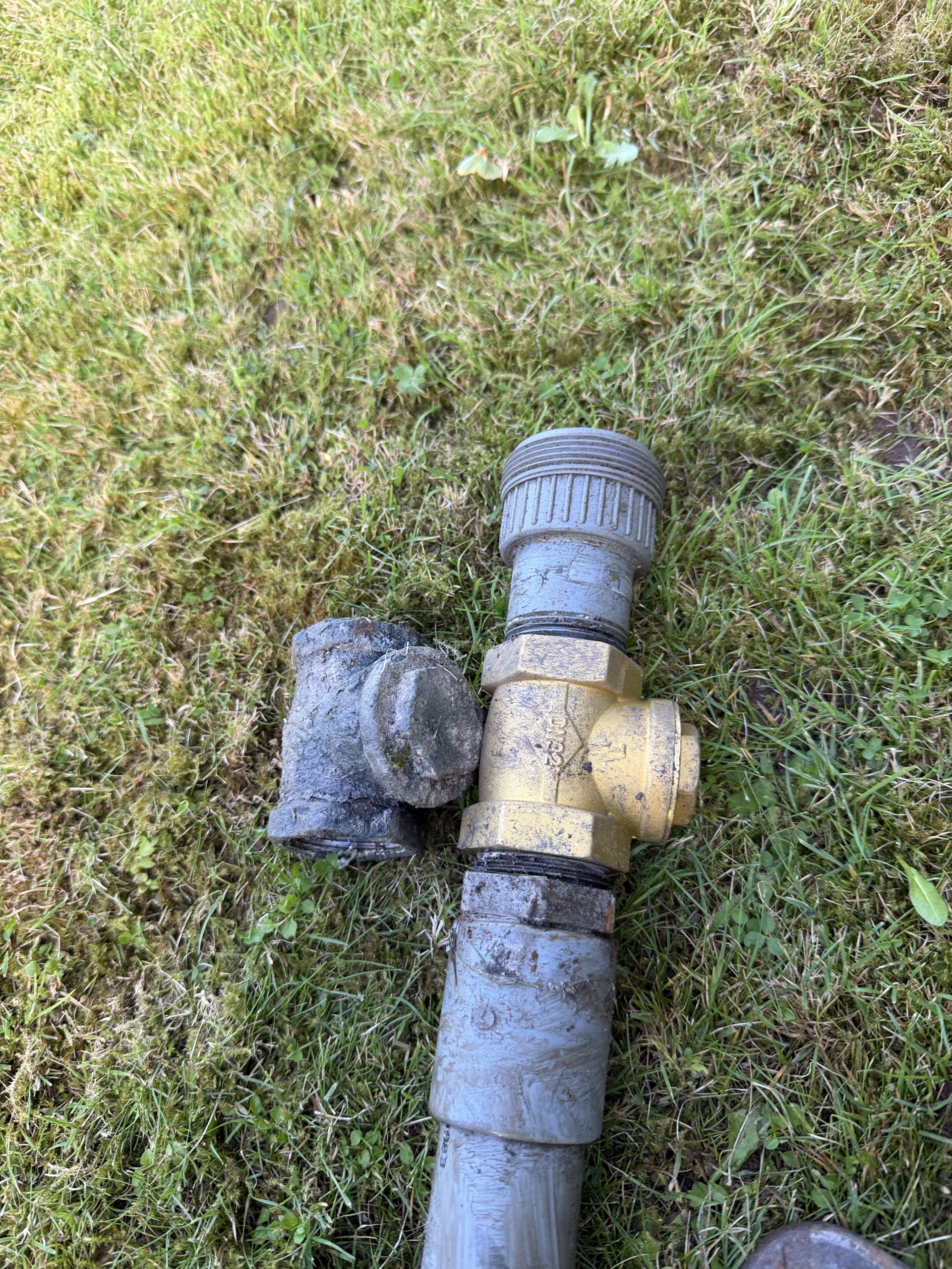 New one and quarter inch non-return valve installed during Klargester P6 BioTec sewage outlet pump repair in Cupar Fife