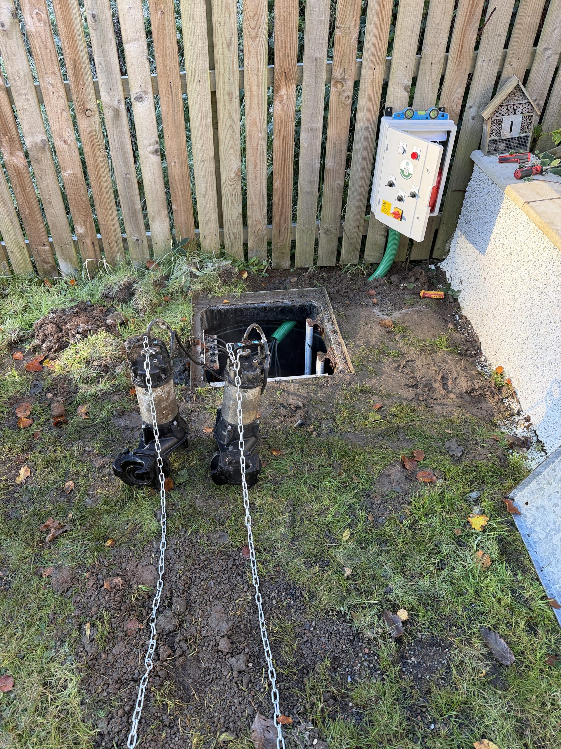 New externally mounted twin pump control panel and stainless steel pump lifting chains installed during sewage pump chamber remedial works