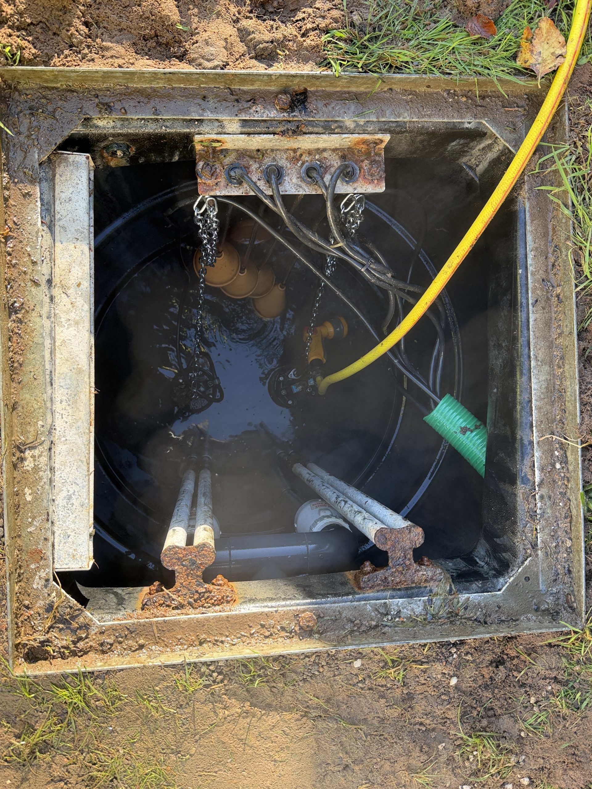 Twin sewage pump chamber with two pumps and four float control arrangement following remedial repairs and recommissioning
